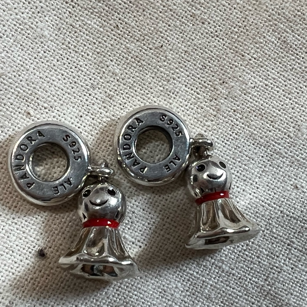 Only one retired Sunny doll charm. One sold